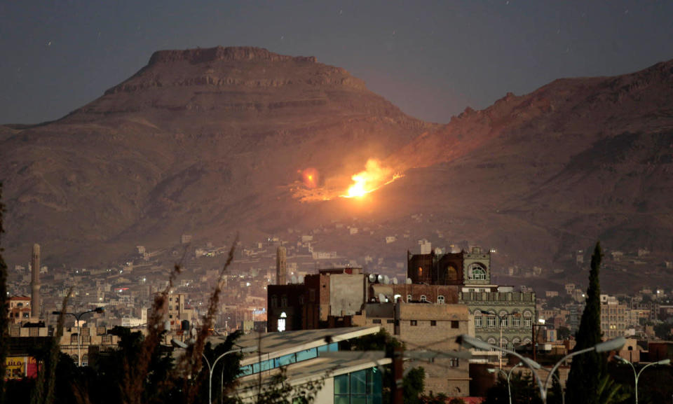 <p>Fire and smoke rise after a Saudi-led airstrike hit a site believed to be one of the largest weapons depots on the outskirts of Yemen’s capital, Sanaa, Friday, Oct. 14, 2016. (AP Photo/Hani Mohammed)</p>