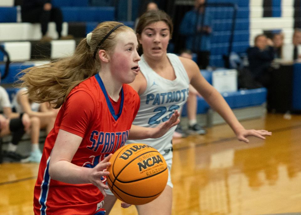 Ocean Eli Clark drives for a first half basket. Ocean Twp. Girls Basketball defeats Freehold Township in Blue Devil Holiday Invitational in West Long Branch on December 28, 2023.