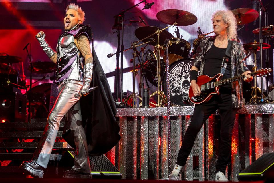 Adam Lambert, left, and Brian May rip out one of Queen's numerous classics at the Rhapsody tour kickoff in Baltimore Oct. 4, 2023.