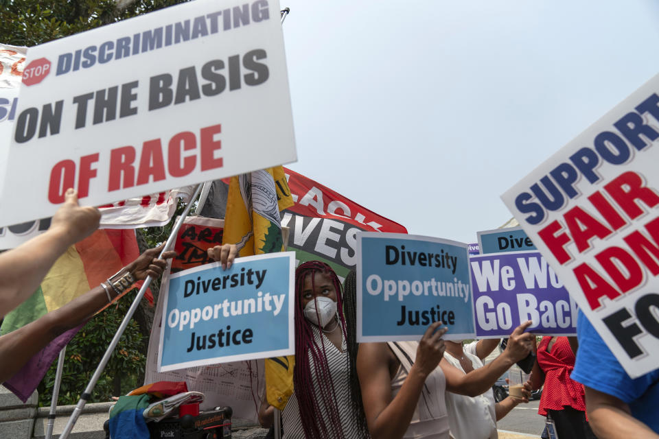 FILE - People protest outside of the Supreme Court in Washington, Thursday, June 29, 2023. Days after the Supreme Court outlawed affirmative action in college admissions on June 29, 2023, activists say they will sue Harvard over its use of legacy preferences for children of alumni. (AP Photo/Jose Luis Magana, File)