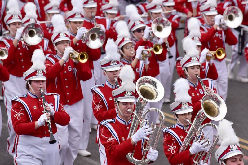 Marching bands often put on spectacular shows, but being in one is a physically demanding activity that can cause disabling injuries. File Photo by Christine Chew/UPI