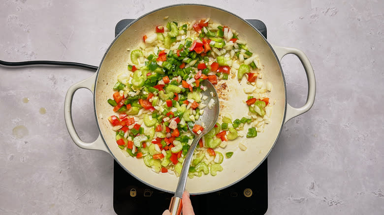 bell peppers and vegetables in skillet