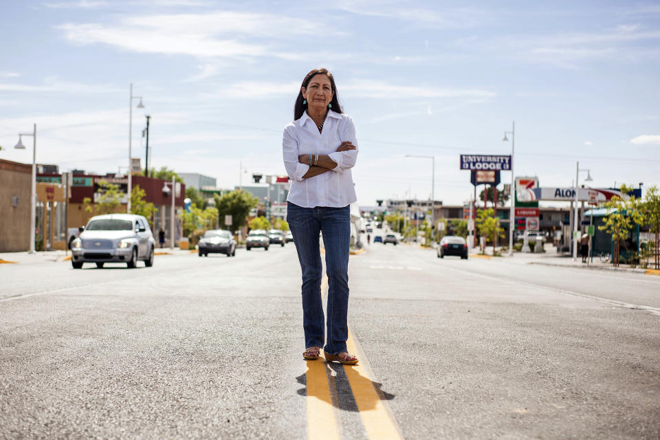 FILE - In this June 5, 2018, file photo, Deb Haaland poses for a portrait in a Nob Hill Neighborhood in Albuquerque, N.M. More than 100 Native Americans are seeking seats in Congress, governor's offices, state legislatures and other posts across the country in what political observers say has been a record number of candidates. Congressional races in New Mexico and Kansas could determine whether Congress has its first Native American representative. (AP Photo/Juan Labreche, File)