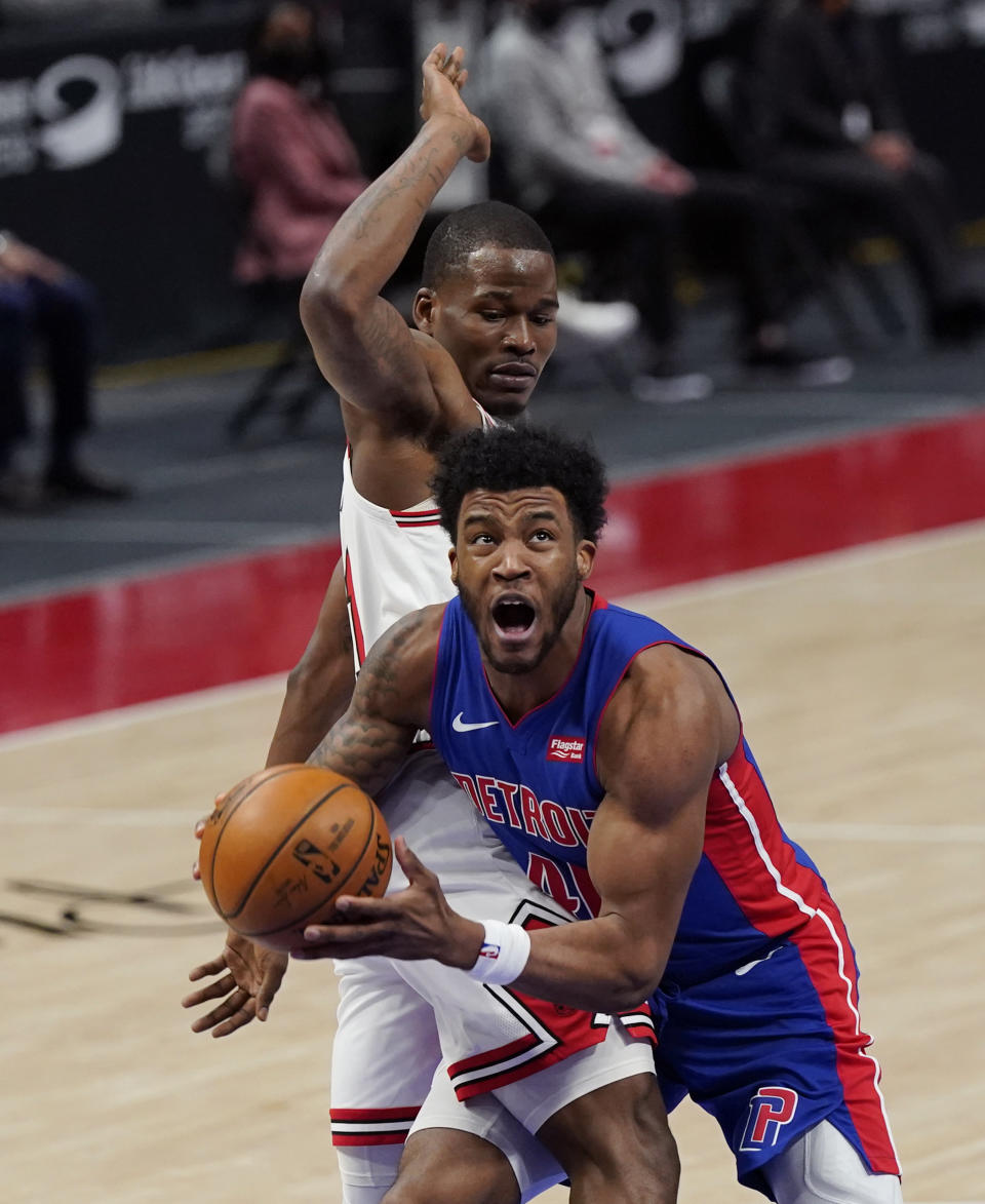 Detroit Pistons forward Saddiq Bey (41) looks towards the basket as Chicago Bulls guard Javonte Green defends during the first half of an NBA basketball game, Sunday, May 9, 2021, in Detroit. (AP Photo/Carlos Osorio)