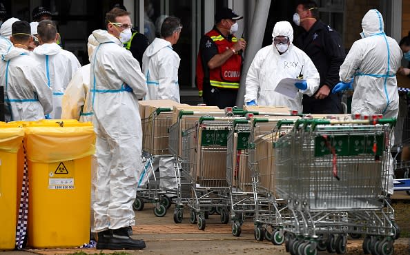 Members of the Melbourne Fire Brigade (MFB) prepare to take food parcels to residents in a locked down public housing estate in Melbourne as the city re-enters a city wide lockdown after a fresh outbreak of the COVID-19 coronavirus. 