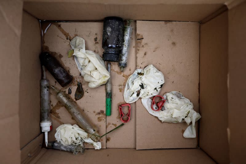 Medical waste collected from Cisadane river is seen inside a cardbox in Tangerang