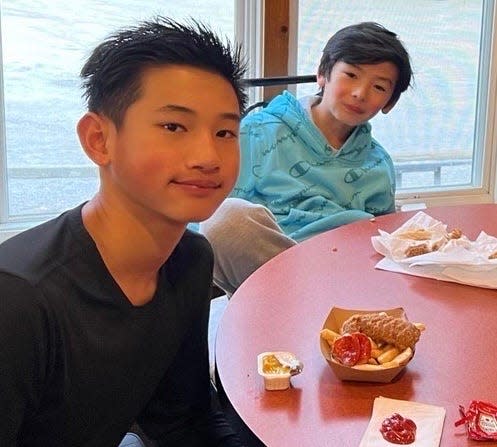 Jeffrey &quot;JT&quot; Tini, 13, and his brother, Nelson Tini, 9, were shot in their home Monday, May 2, 2022. Their mother, Trinh Nguyen has been charged.