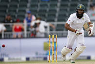 South Africa's Hashim Amla makes a run during the third cricket test match against England in Johannesburg, South Africa, January 14, 2016. REUTERS/Siphiwe Sibeko