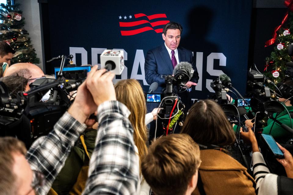 Republican presidential candidate Ron DeSantis speaks with reporters during a campaign stop at Elevate Business and Events Center on Friday, Dec. 8, 2023, in West Des Moines.