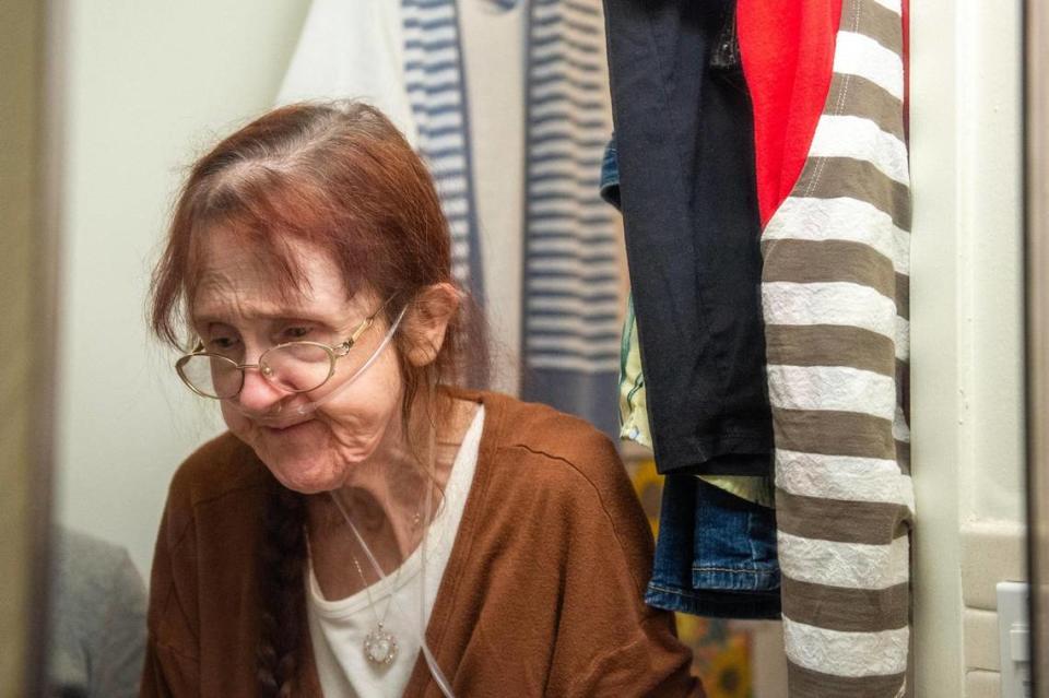 Michelle Paylor, a resident of Independence Towers, gives a tour of her living conditions in her studio apartment at Independence Towers on Tuesday, March 19, 2024, in Independence.