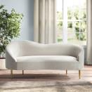 <p><strong>Willa Arlo Interiors</strong></p><p>wayfair.com</p><p><strong>$1039.99</strong></p><p>Add this curved beauty to your otherwise dull ensemble (or so it seems) of furniture full of angular, geometric shapes and sharp lines, and it'll smoothen up and soften the whole facade for a more inviting, warmer living room. Your lounge time needs not be so edgy, literally. </p>