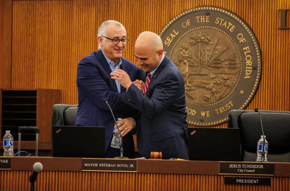 Hialeah City Mayor Esteban Bovo, Jr. (left) and Council President Jesús Tundidor greet each other during a meeting that included the first reading of the proposed ordinance modifying a code chapter on commercial vehicles, recreational vehicles, boats or vessels, at the mayor’s office, on Tuesday, January 9, 2024.
