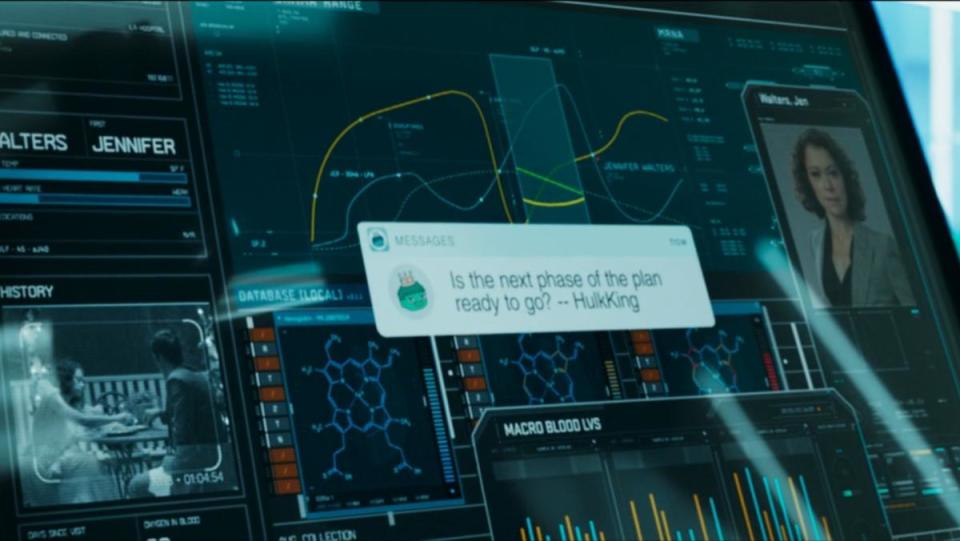 A still from She-Hulk Episode Six shows a lab screen with a notification from KingHulk asking about the next phase of the plan