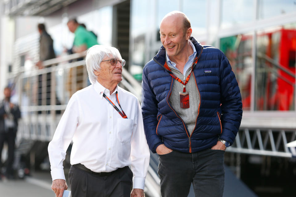 SPIELBERG, AUSTRIA - JUNE 20:  F1 supremo Bernie Ecclestone speaks with CVC co-founder Donald Mackenzie in the paddock after qualifying for the Formula One Grand Prix of Austria at Red Bull Ring on June 20, 2015 in Spielberg, Austria.  (Photo by Charles Coates/Getty Images)