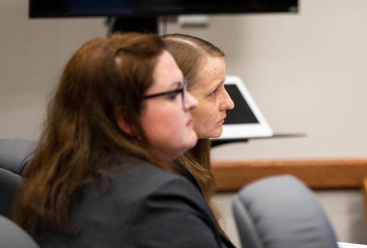 Rebecca Ruud next to one of her attorneys during her trial I n which she is charged with first-degree and second-degree murder, abuse or neglect of a child, tampering with physical evidence, and abandonment of a corpse in the death of her daughter Savannah Leckie in 2017. 