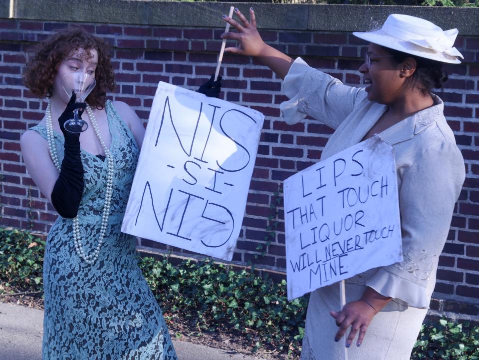 Miranda Manier, left, and Dani Lyons prepare to perform at the "Bootlegger's Bash" at the Studebaker National Museum and The History Museum on April 26, 2024, on the museums' campus. The actors are members of the theater group Shades of Orange.