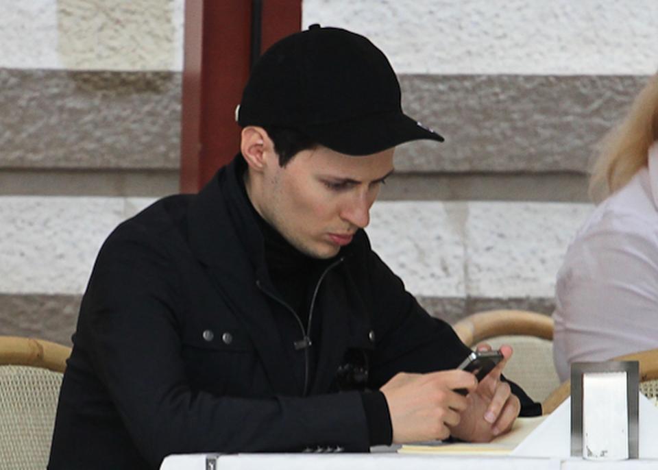 In this photo taken Saturday, May 19, 2012, Pavel Durov, founder of Russia's leading social network site VKontakte, or "in contact", sits in a cafe in Red Square in Moscow, Russia. Creator of Russia's leading social network Durov left his post as CEO on Tuesday April 22, 2014, and is understood to have left Russia, one week after he posted online what he said were documents from the security services demanding personal details from 39 Ukraine-linked groups on VKontakte.(AP Photo/Roman Kulik)