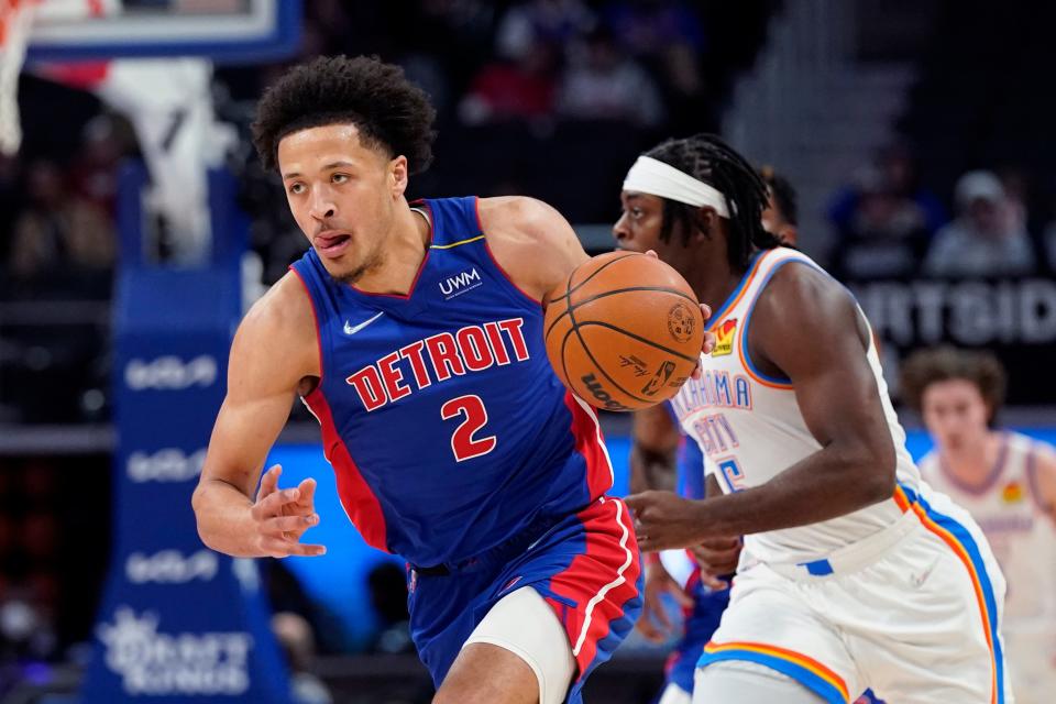 Pistons guard Cade Cunningham drives up court during the first half on Monday, Dec. 6, 2021, at Little Caesars Arena.