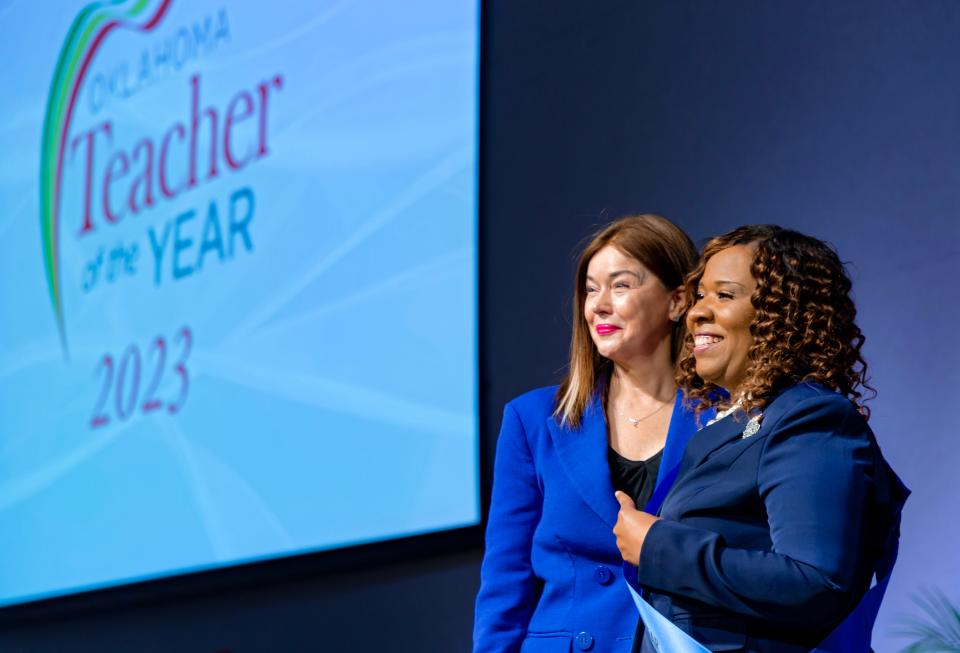 Booker T. Washington High School teacher Traci Manuel, right, poses in March for a photo with Tulsa Public Schools Superintendent Deborah Gist.