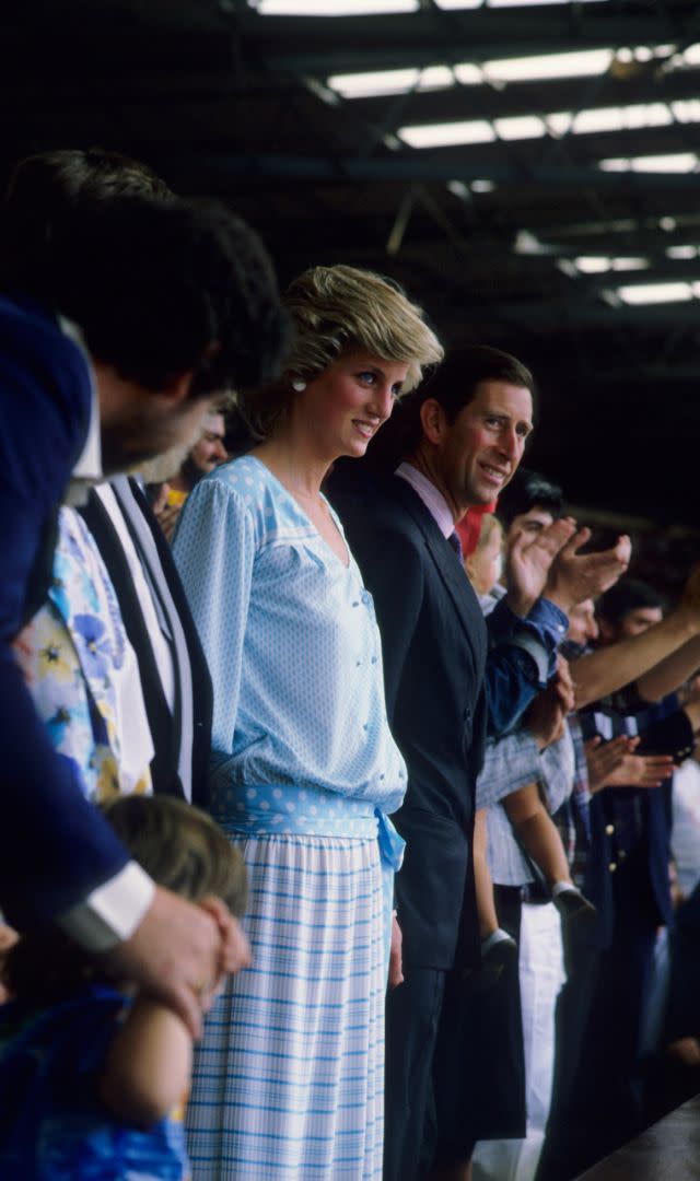 LONDON, UNITED KINGDOM – JULY 13: HRH Princess Diana and HRH Prince Charles watch from the crowd during the Live Aid concert at Wembley Stadium in London, 13th July 1985. The concert raised funds for famine relief in Ethiopia. (Photo by Georges De Keerle/Getty Images)