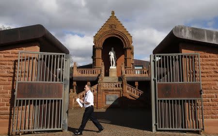 A man leaves the Burns Monument Centre in Kilmarnock, Scotland March 27, 2014. REUTERS/Suzanne Plunkett