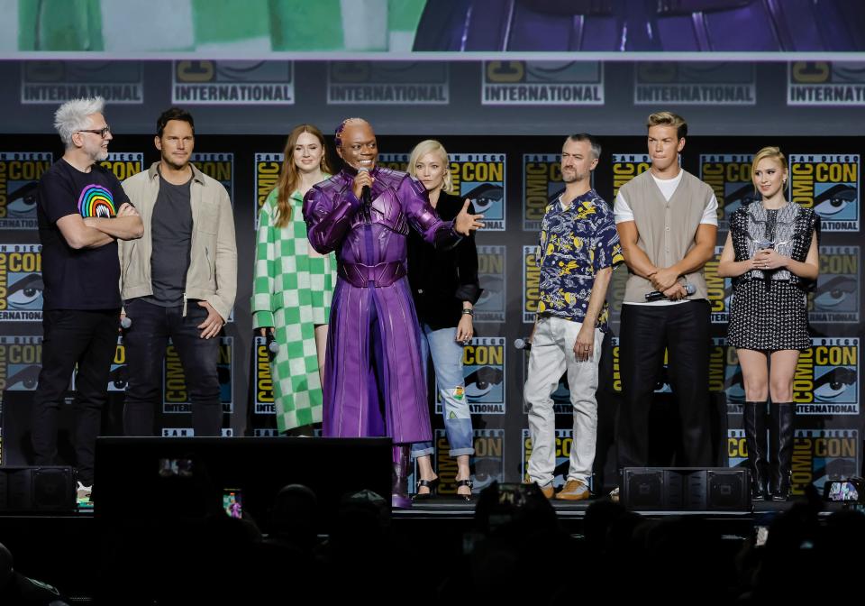 James Gunn, Chris Pratt, Karen Gillan, Chukwudi Iwuji, Pom Klementieff, Sean Gunn, Will Poulter, and Maria Bakalova speak onstage at the Marvel Cinematic Universe Panel during 2022 Comic Con International: San Diego at San Diego Convention Center on July 23, 2022 in San Diego, California.