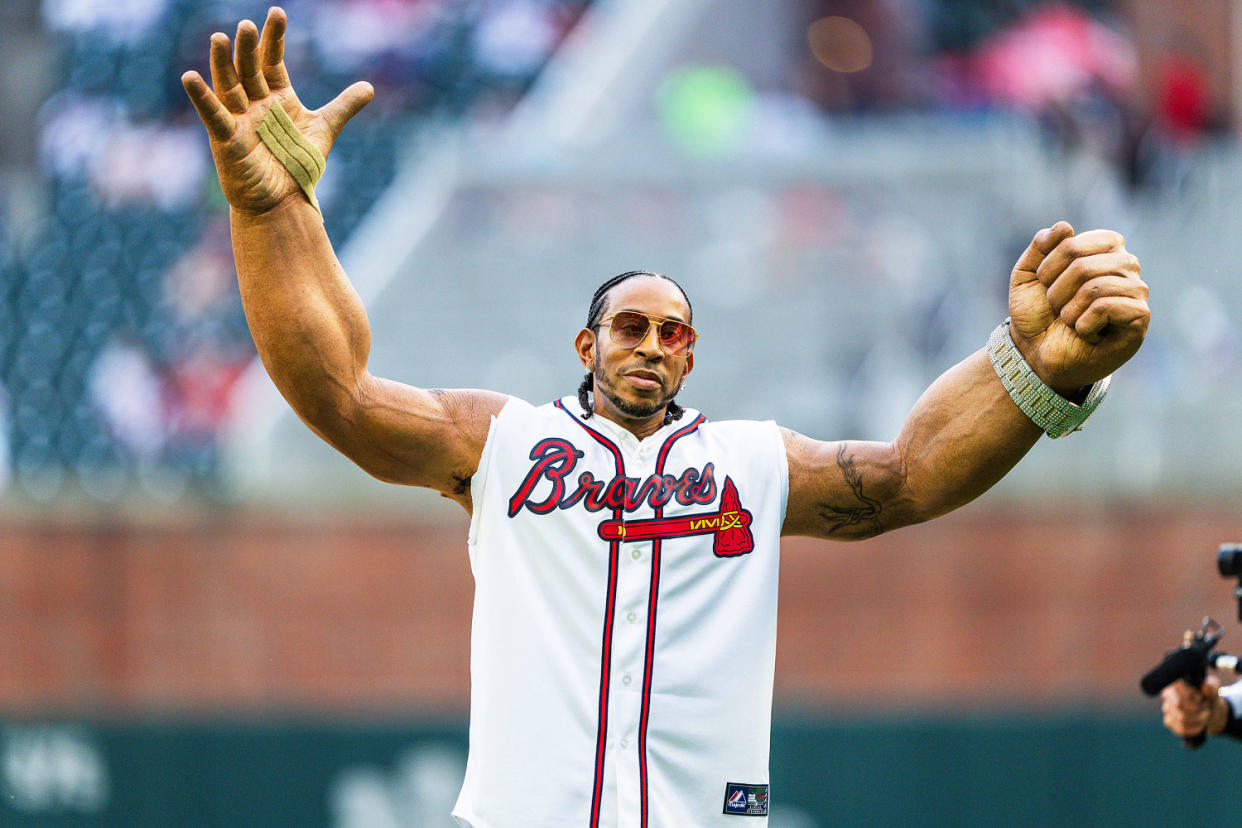 Ludacris reacts after throwing out the first pitch before the Atlanta Braves game. (Matthew Grimes Jr./Atlanta Brave / Getty Images)