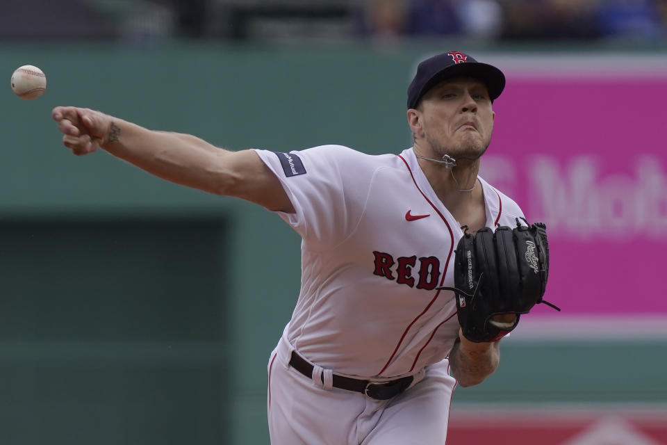 Boston Red Sox's Tanner Houck delivers a pitch to a Tampa Bay Rays hitter in the first inning of a baseball game, Sunday, June 4, 2023, in Boston. (AP Photo/Steven Senne)