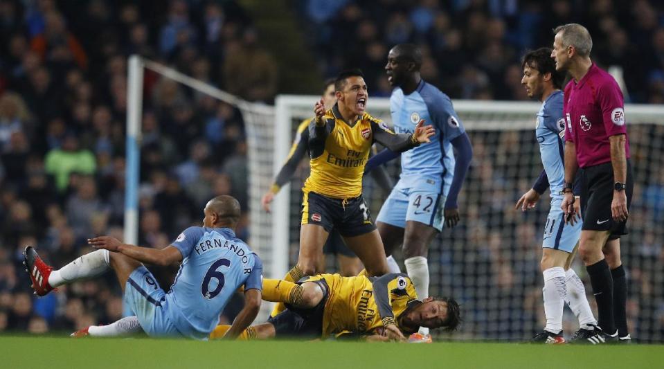 <p>Britain Football Soccer – Manchester City v Arsenal – Premier League – Etihad Stadium – 18/12/16 Arsenal’s Alexis Sanchez appeals to referee Martin Atkinson after a challenge between Manchester City’s Fernando and Arsenal’s Mesut Ozil Reuters / Phil Noble Livepic EDITORIAL USE ONLY. No use with unauthorized audio, video, data, fixture lists, club/league logos or “live” services. Online in-match use limited to 45 images, no video emulation. No use in betting, games or single club/league/player publications. Please contact your account representative for further details. </p>