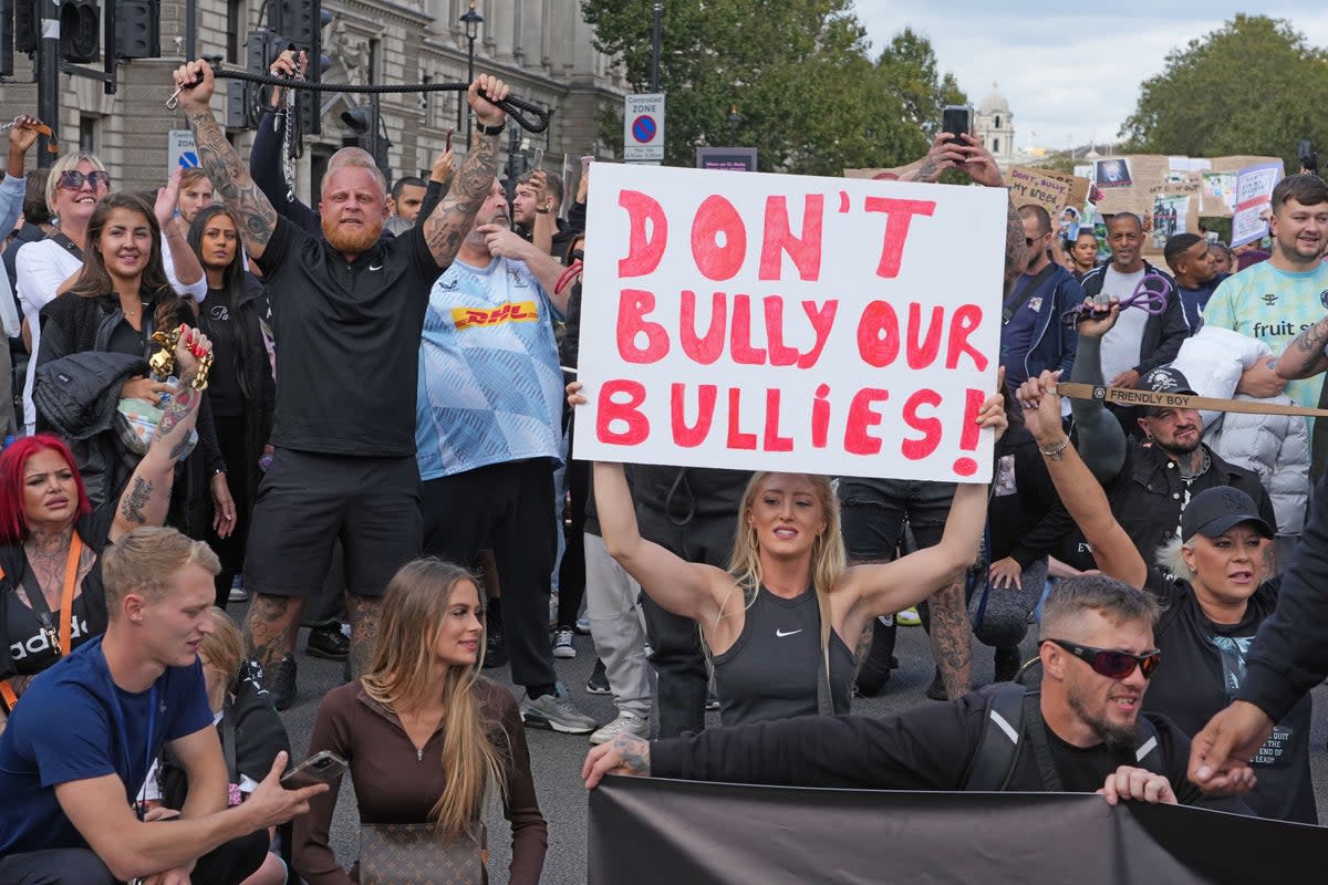 People take part in a protest in central London, against the Government’s decision to add XL bully dogs to the list of prohibited breeds under the Dangerous Dogs Act (Jeff Moore/PA) (PA Wire)