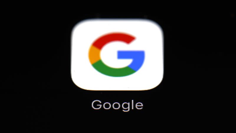 This 2018 file photo shows the Google app on an iPad in Baltimore. A lawsuit targeting the Google Play store, where consumers download most of the apps designed for the Android software that powers most of the world’s smartphones, has been tentatively settled, according to reports. 