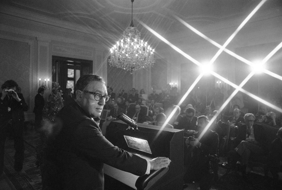 FILE - U.S. Secretary of State Henry Kissinger faces international press at a news conference in Schloss Klessheim in Salzburg, June 11, 1974. Kissinger, the diplomat with the thick glasses and gravelly voice who dominated foreign policy as the United States extricated itself from Vietnam and broke down barriers with China, died Wednesday, Nov. 29, 2023. He was 100. (AP Photo, File)
