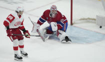 Detroit Red Wings' Patrick Kane (88) scores against Montreal Canadiens goaltender Cayden Primeau (30) during a shootout in an NHL hockey game in Montreal on Tuesday, April 16, 2024. (Christinne Muschi/The Canadian Press via AP)