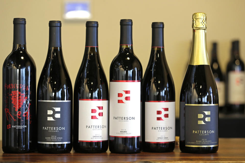 In this photo taken Thursday, Nov. 21, 2019, a variety of wines are lined-up for tasting later in the day at Patterson Cellars winery in Woodinville, Wash. Washington, which now boasts more than 1,000 wineries in the state, has become a force in the wine industry. The state is the second-largest producer of premium wines in the United States, trailing only California. (AP Photo/Elaine Thompson)