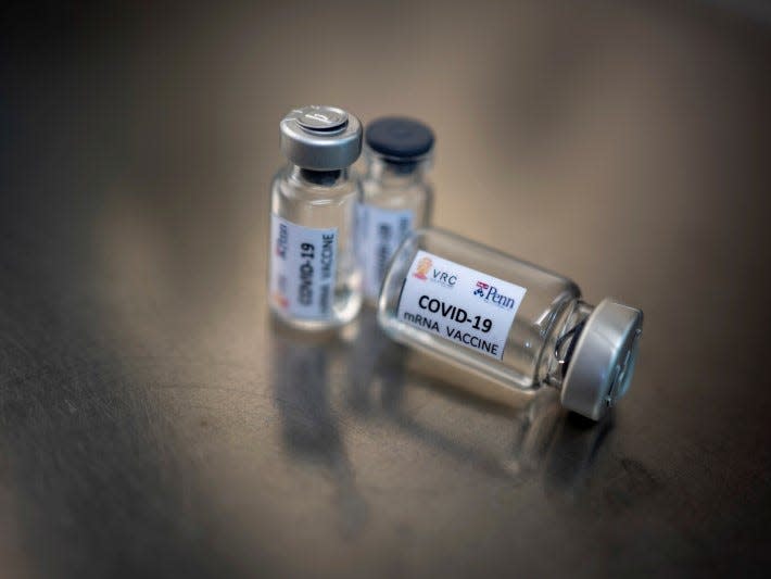 FILE PHOTO: Phials of an mRNA type vaccine candidate for the coronavirus disease (COVID-19) are pictured at Chulalongkorn University during  the development of an mRNA type vaccine for the coronavirus disease (COVID-19) in Bangkok, Thailand, May 25, 2020. REUTERS/Athit Perawongmetha/File Photo