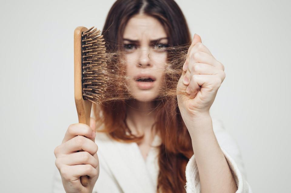  <span class="attribution"><a class="link " href="https://www.shutterstock.com/image-photo/girl-comb-problem-hair-on-white-557050852" rel="nofollow noopener" target="_blank" data-ylk="slk:ShotPrime Studio / Shutterstock;elm:context_link;itc:0;sec:content-canvas">ShotPrime Studio / Shutterstock</a></span>