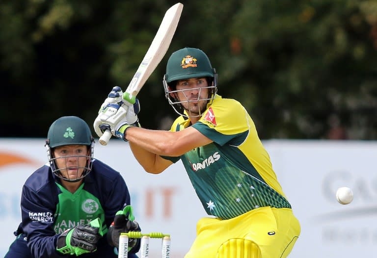 Australia's Joe Burns watches the ball after playing a shot during a one day international (ODI) cricket match between Ireland and Australia at Stormont Cricket Club in Belfast on August 27, 2015