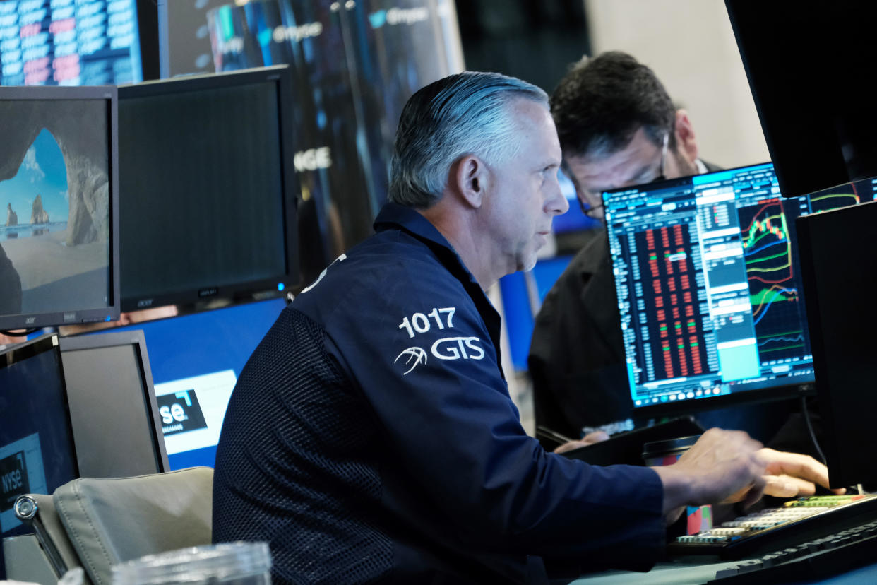 NEW YORK, NEW YORK - JUNE 03: Traders work on the floor of the New York Stock Exchange (NYSE) at the start of the trading day on June 03, 2022 in New York City. A new jobs report released by the Labor Department this morning shows employers added 390,000 jobs in May. Stocks pointed lower ahead of the opening bell on Friday, putting indexes back into the red for the week.  (Photo by Spencer Platt/Getty Images)