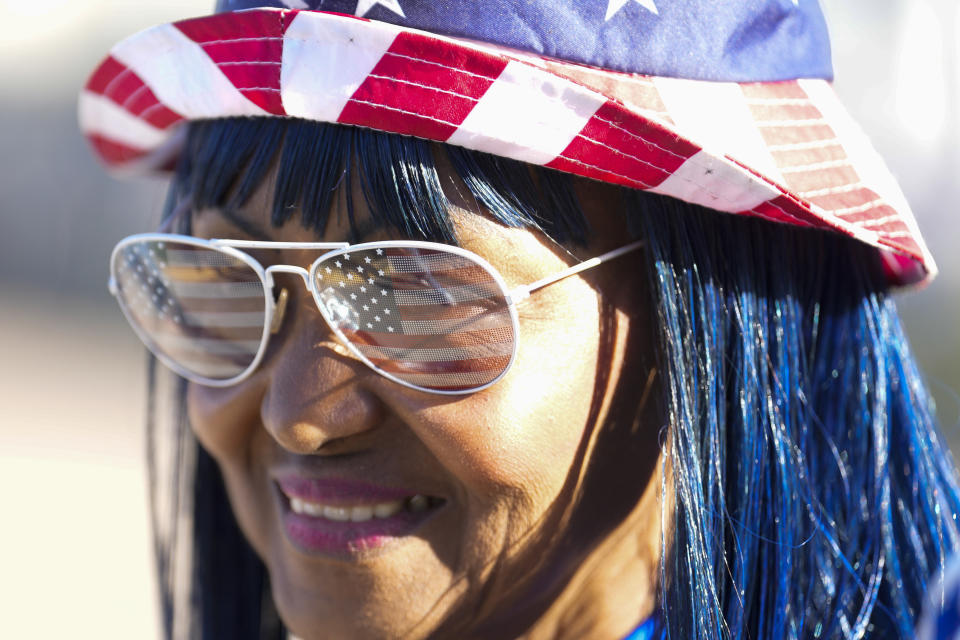 Sherry Browning wears patriotic gear on Election Day on Tuesday, Nov. 7, 2023, at West Gray Metropolitan Multi-Service Center in Houston. (Yi-Chin Lee/Houston Chronicle via AP)