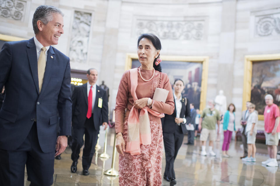 San Suu Kyi, state counsellor of Myanmar, and Frank Larkin, Senate sergeant-at-arms, walk through the Capitol Rotunda between meetings with House Minority Leader Nancy Pelosi (D-Calif.)&nbsp;and Senate leaders on Sept. 15, 2016.