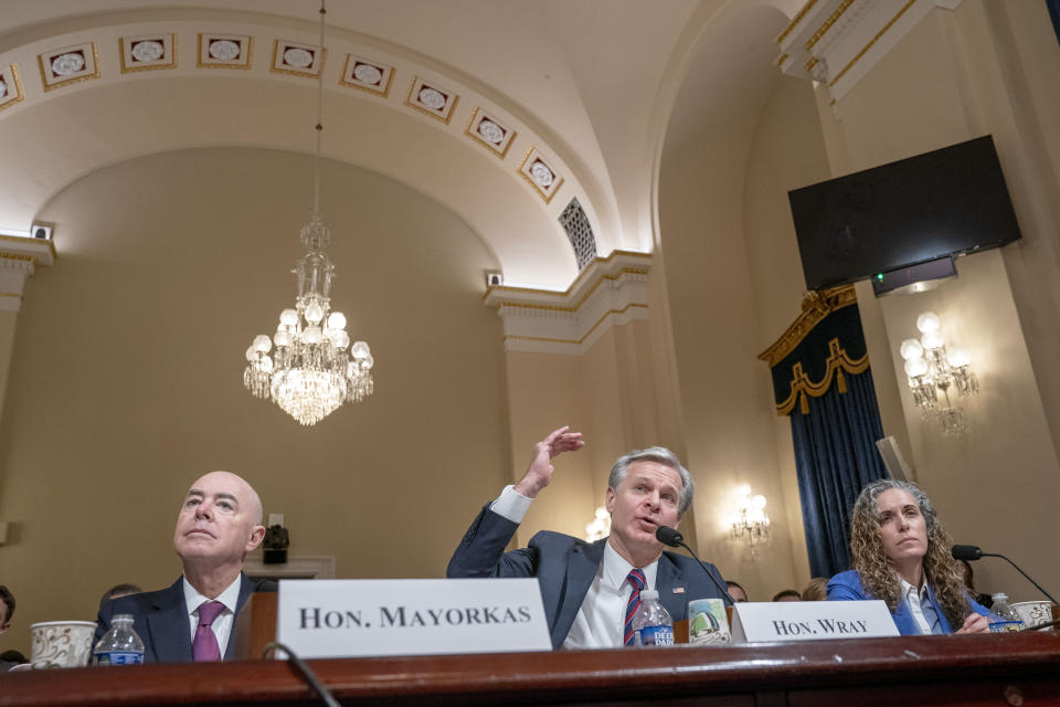 FBI Director Christopher Wray, center, testifies next to Homeland Security Secretary Alejandro Mayorkas, left, and Christine Abizaid, Director of the National Counterterrorism Center, right, during a House Committee on Homeland Security hearing on worldwide threats to the United States, Wednesday, Nov. 15, 2023, on Capitol Hill in Washington. (AP Photo/Jacquelyn Martin)