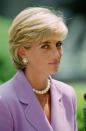 <p>She wore the choker again, this time a fatter version, with a suit-dress at the Red Cross headquarters in Washington, D.C., to make a speech for the anti-land-mine campaign (Photo: Tim Graham/Getty Images). </p>