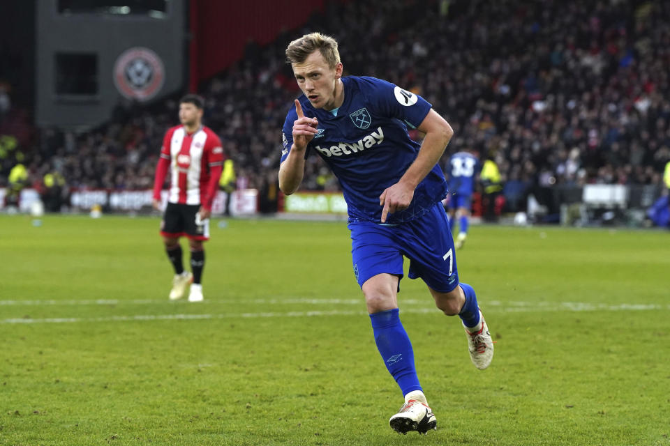 West Ham United's James Ward-Prowse celebrates scoring his side's second goal of the game from the penalty spot during the English Premier League soccer match between Sheffield United and West Ham United at Bramall Lane, in Sheffield, England, Sunday, Jan. 21, 2024. (Nick Potts/PA via AP)