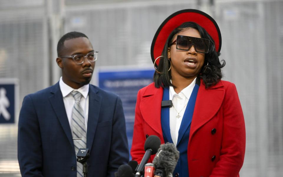 Bridgett Floyd (R), sister of George Floyd, speaks to the media outside the Hennepin County Government Center where jury selection is taking place in the trial of former officer Derek Chauvin  - Shutterstock