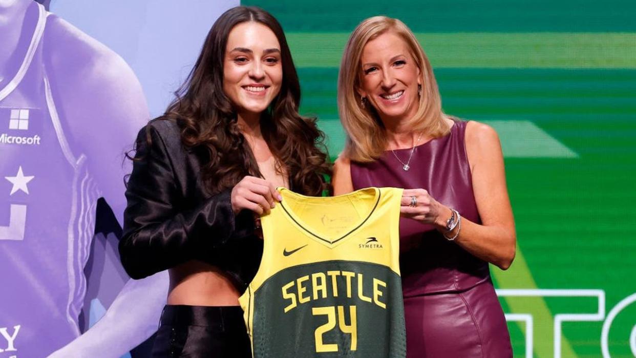 <div>NEW YORK, NEW YORK - APRIL 15: Nika Muhl poses with WNBA Commissioner Cathy Engelbert after being selected 14th overall pick by the Seattle Storm during the 2024 WNBA Draft at Brooklyn Academy of Music on April 15, 2024 in New York City.</div> <strong>(Sarah Stier / Getty Images)</strong>