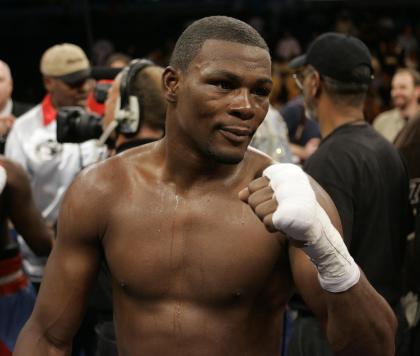 Jermain Taylor poses after winning by split decision over Cory Spinks in 2007. (AP)