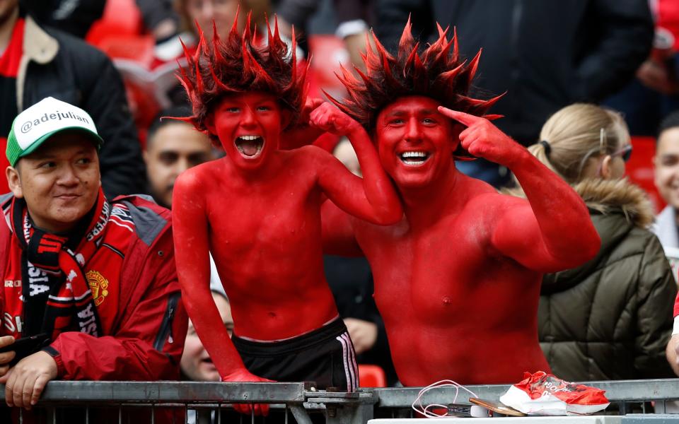 Manchester United fans before the match - Credit: REUTERS