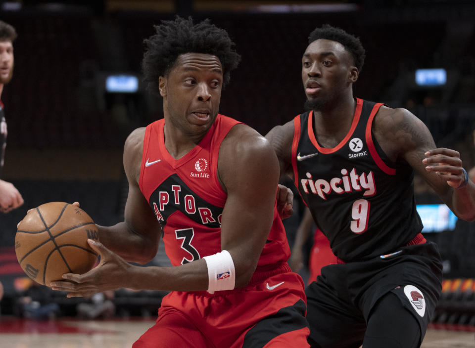 Toronto Raptors forward OG Anunoby (3) turns on Portland Trail Blazers forward Nassir Little (9) during first-half NBA basketball game action in Toronto, Sunday Jan. 23, 2022. (Frank Gunn/The Canadian Press via AP)