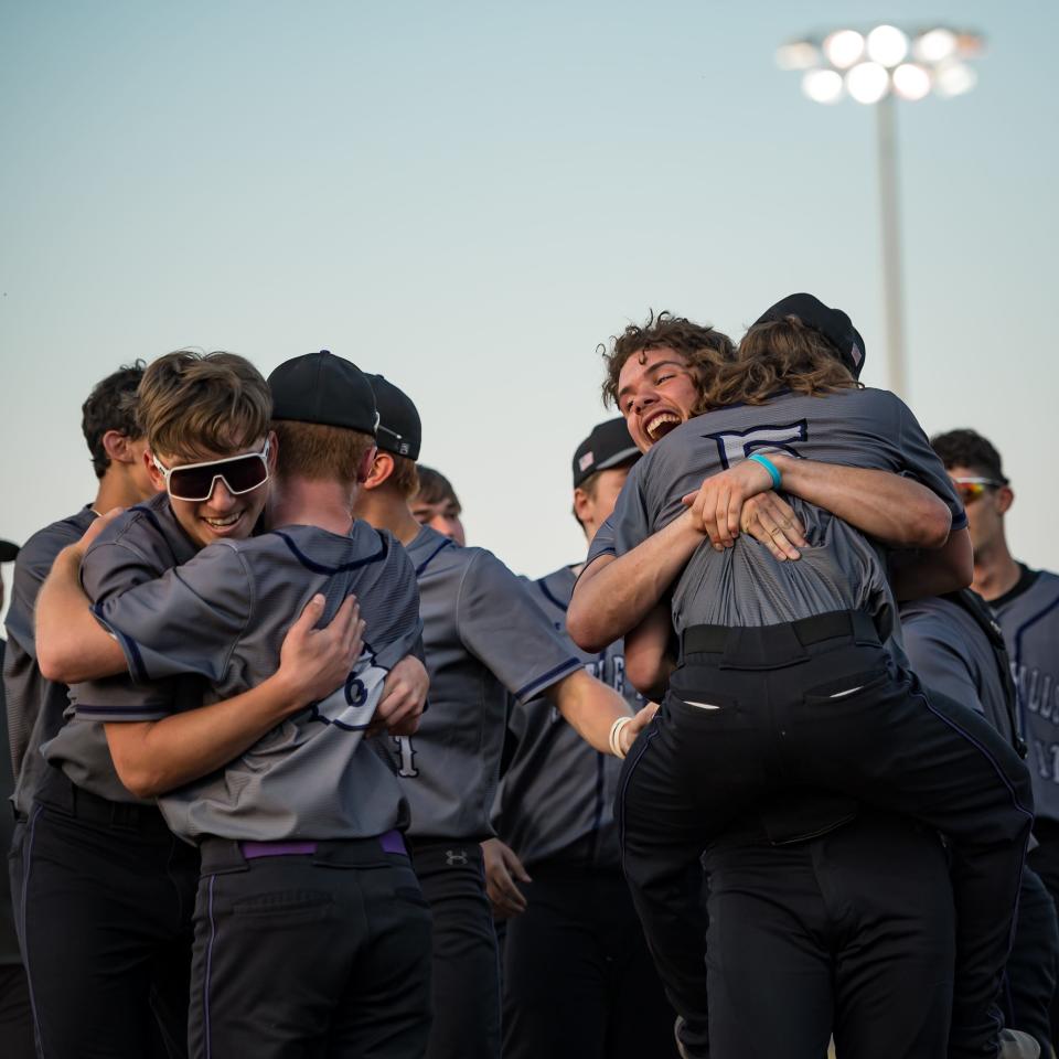 Little Falls players celebrate after defeating Bishop Ludden 7-1 during the finals of the 2023 Section III Class C Baseball Tournament at Onondaga Community College on Tuesday,