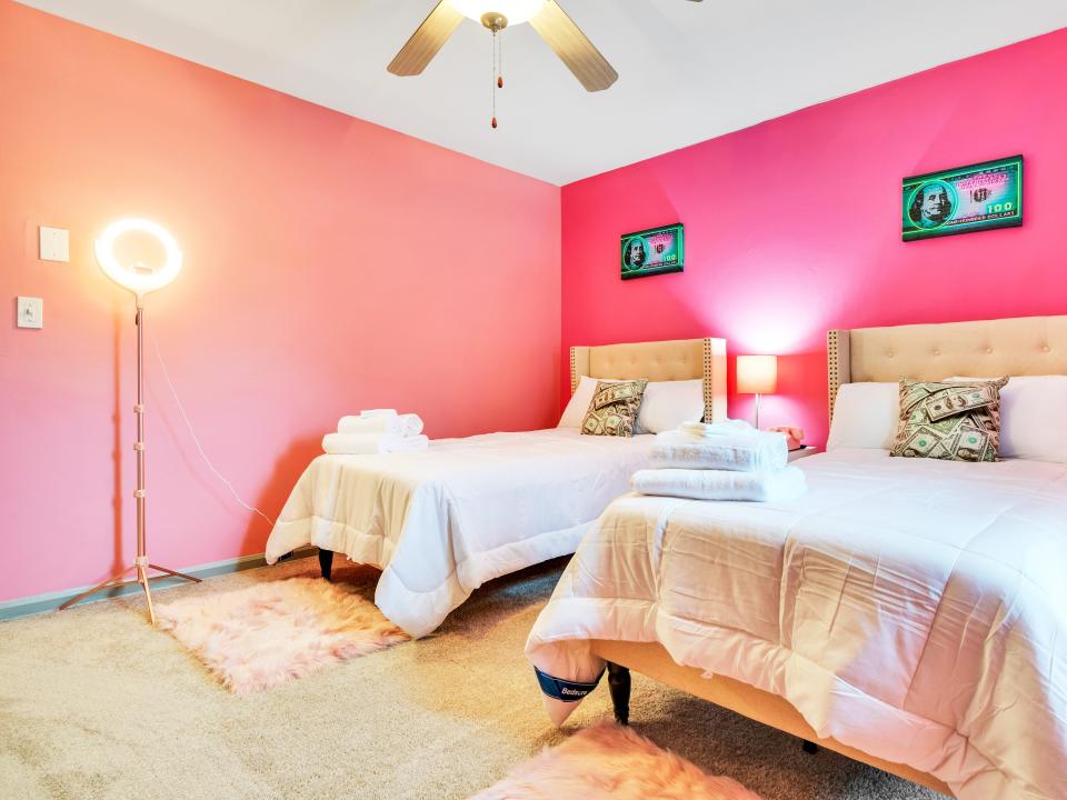 A bedroom in the Girlboss Getaway, an Airbnb.